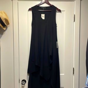 Never been worn, tags still on!! Black, sleeveless hi-low dress.